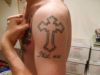 cross pic tattoo on arm